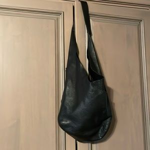 HAMMITT leather purse with grommets.Signature red stripe. Pockets in and out.